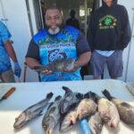 a person holding a fish