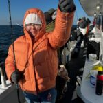 a person that is standing in the snow