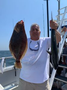 a person holding a fish