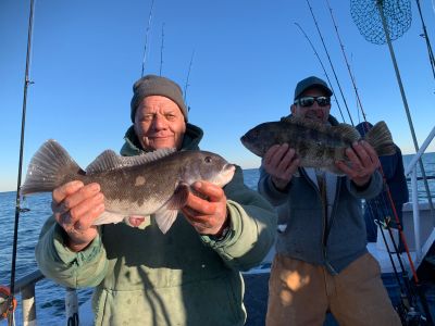 a person holding a fish