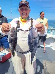 a person holding a fish