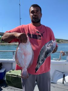 Nicolas Mas holding a fish