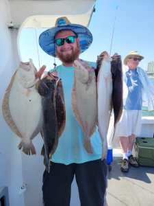 a man holding a fish