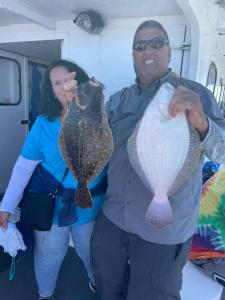 a man holding a fish